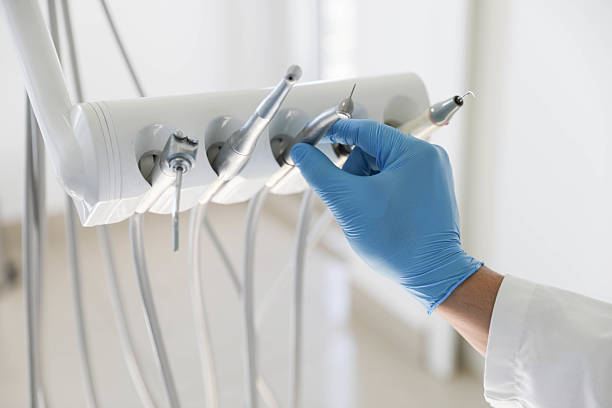 Professional Tooth Extraction technician working in Holland, MI
